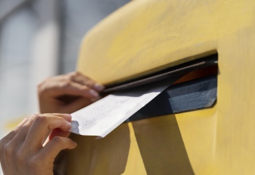 close up woman mailbox with envelope